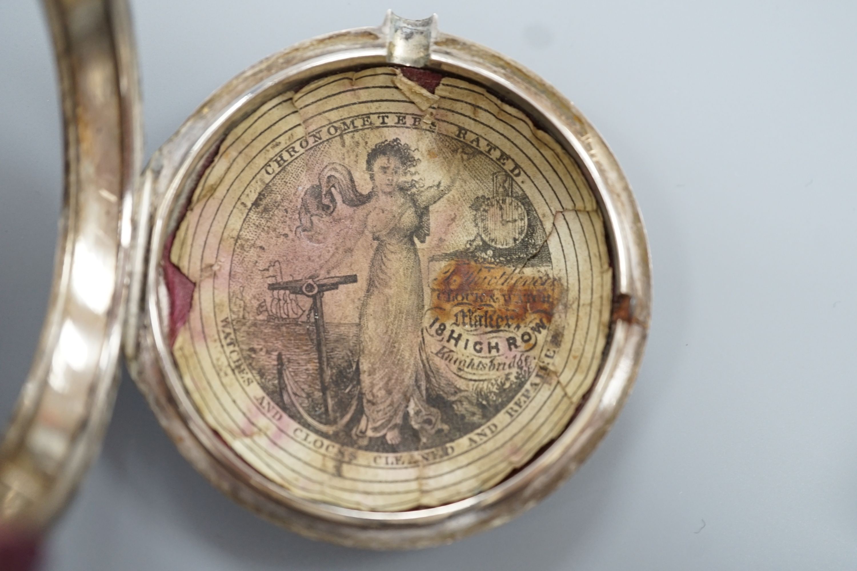 A George III silver pair case keywind pocket watch, by John Williams, Shoreditch, with unusual triple dial, retailed by William Crocker, case diameter, 48mm, the signed movement with diamond set cock.